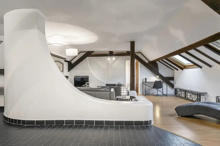 Luxury Attic 2-Bedroom Apartment with Exposed Beams near Lausanne Train Station Interior 1