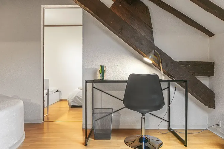Luxury Attic 2-Bedroom Apartment with Exposed Beams near Lausanne Train Station Interior 4